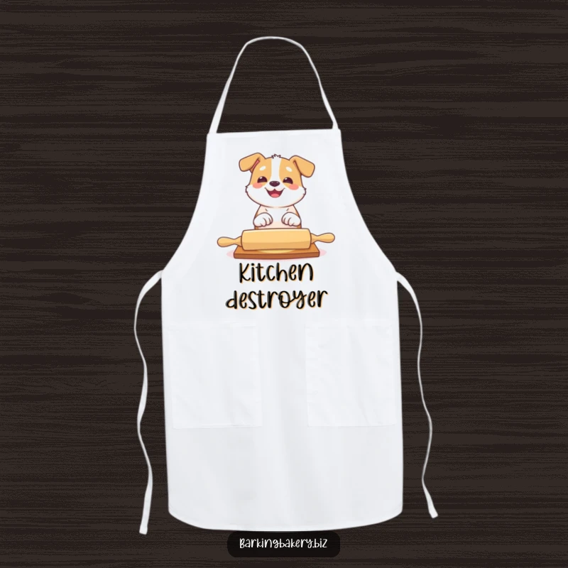 Funny dog apron with a dog playfully batting at a rolling pin with a big grin, perfect for bakers.
