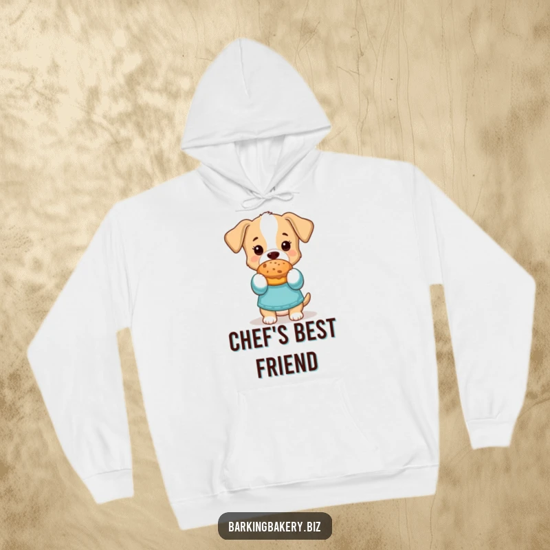 Funny Hoodie: A smiling dog in oven mitts presents a delicious baked treat, radiating warmth and pride.