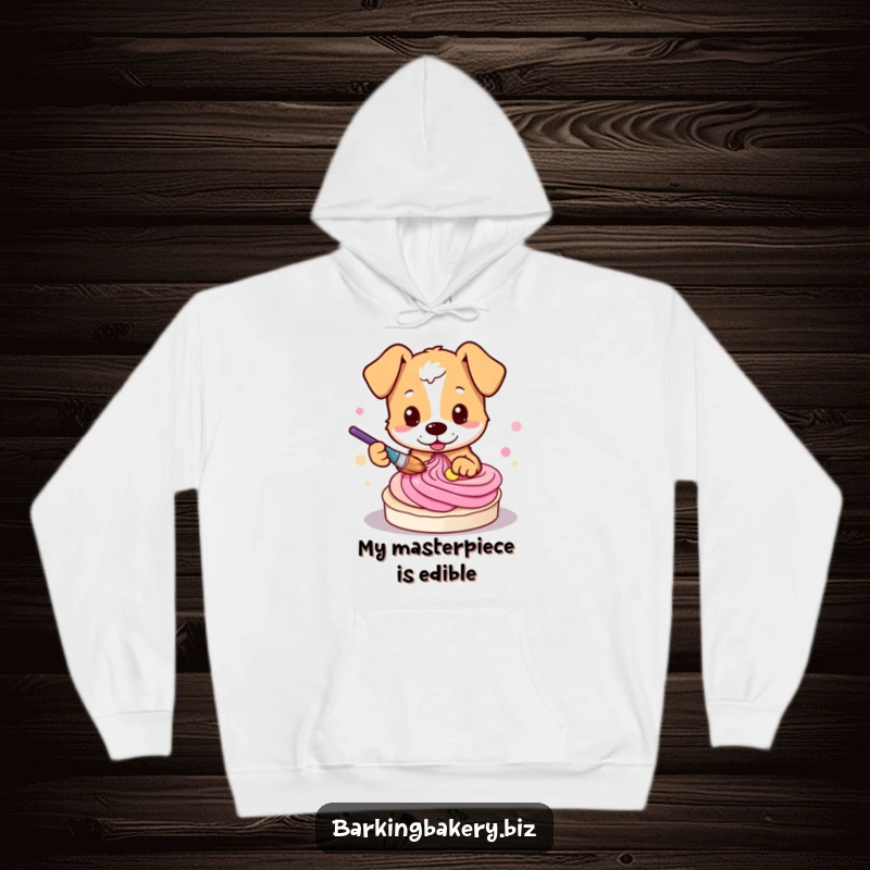 Funny dog hoodie depicting a cute dog artist skillfully creating colorful frosting swirls with a paintbrush.