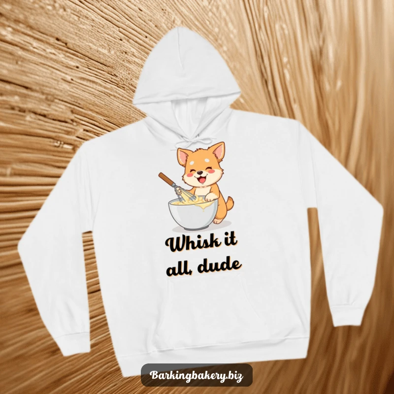 Funny dog hoodie illustration of an energetic dog holding a large whisk, mixing batter in a bowl with gusto.