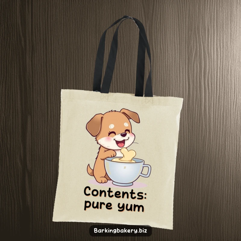 Funny dog tote bag featuring a happy dog sampling batter from a mixing bowl, a symbol of delicious temptation.