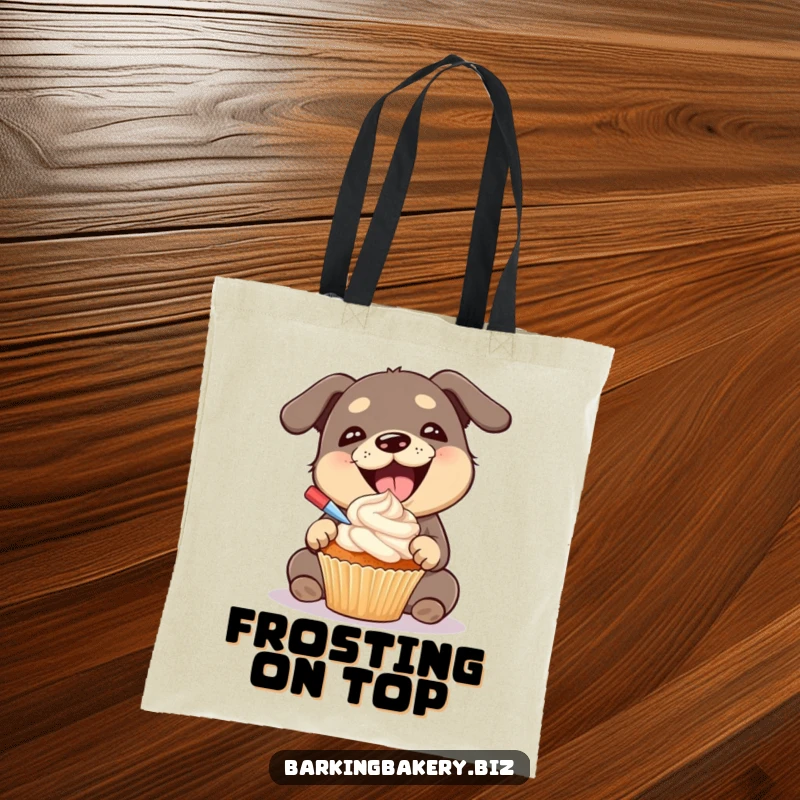 Funny dog tote bag with an image of a gleeful dog happily frosting a cupcake, a perfect bag for sweet treats.