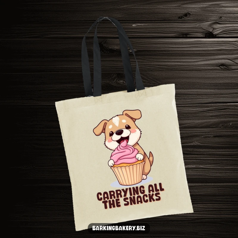 Funny dog tote bag depicting a dog gleefully frosting a lopsided cupcake with a pink swirl, a baker's stylish companion.